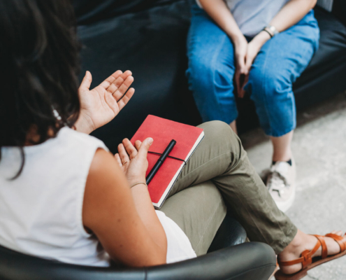 Psychotherapy session, woman talking to his psychologist in the